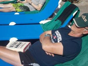 Leon was hard at work, studying the war of 1812 intently.  Lucky he didn't have a test on that subject. He actually reads that stuff for fun.