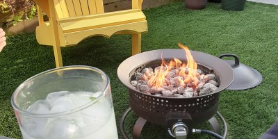 firepit, muskoka chair, cold drink, warm blanket, green backyard