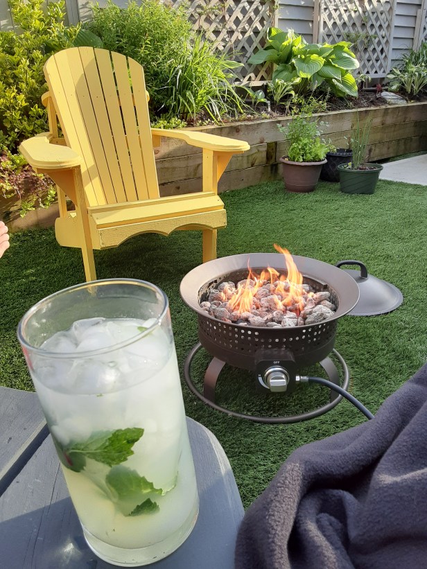 firepit, muskoka chair, cold drink, warm blanket, green backyard